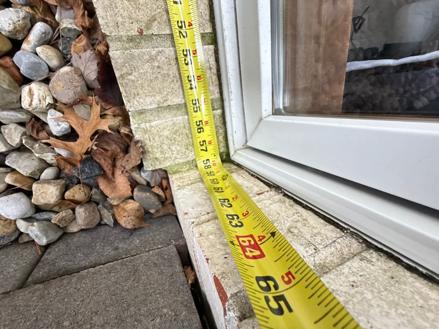 Storm-damaged window documented in Tanglewood